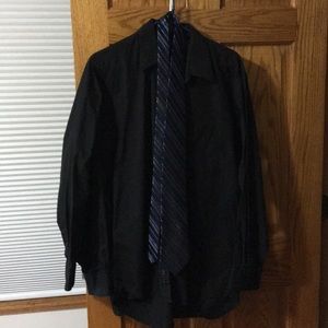 Black button down shirt with striped tie